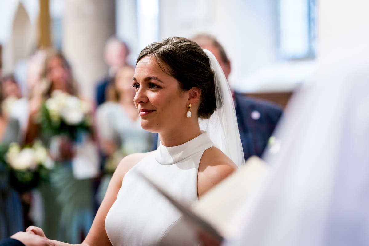 A bride during the ceremony, the photograph becoming a moving scene